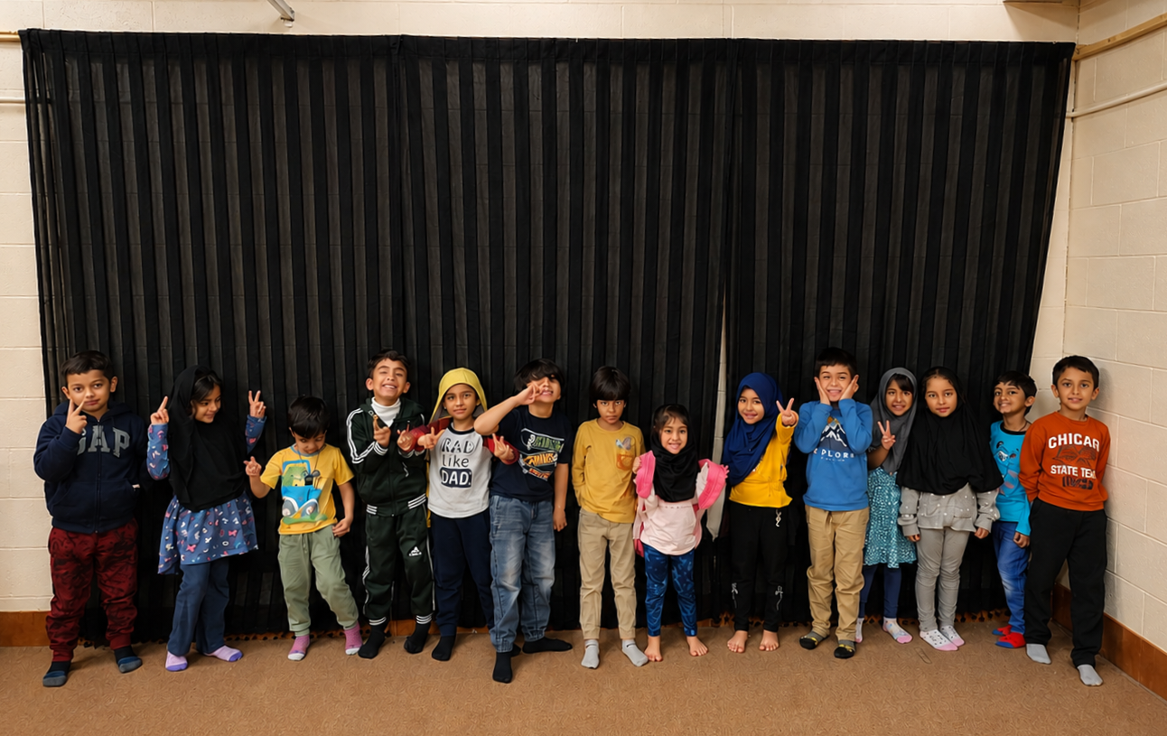 Zainabia Academy students standing together in class